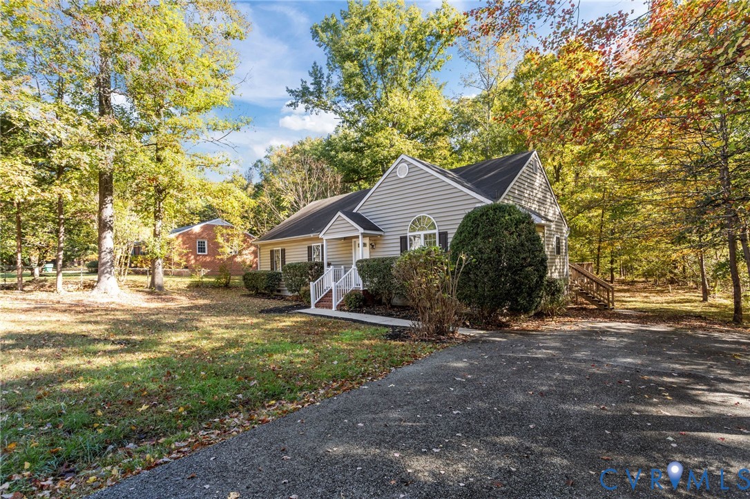 5329 Meadoway Road North Chesterfield, VA 23234 - Photo 18 of 18 There is a long, paved driveway that holds several