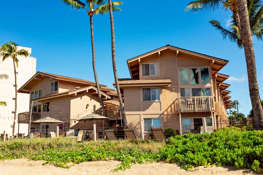 115 North Kihei Road, Unit B1 Kihei, HI 96753 - Photo 21 of 29 a front view of a house with a yard