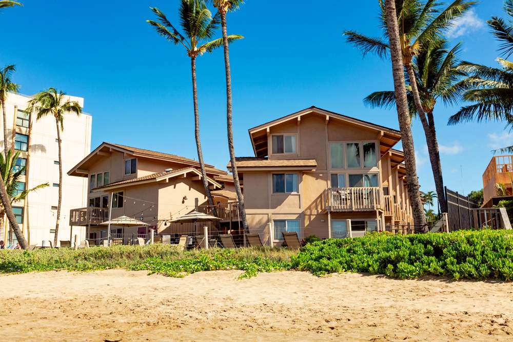 115 North Kihei Road, Unit B1 Kihei, HI 96753 - Photo 3 of 29 a front view of a house with a yard