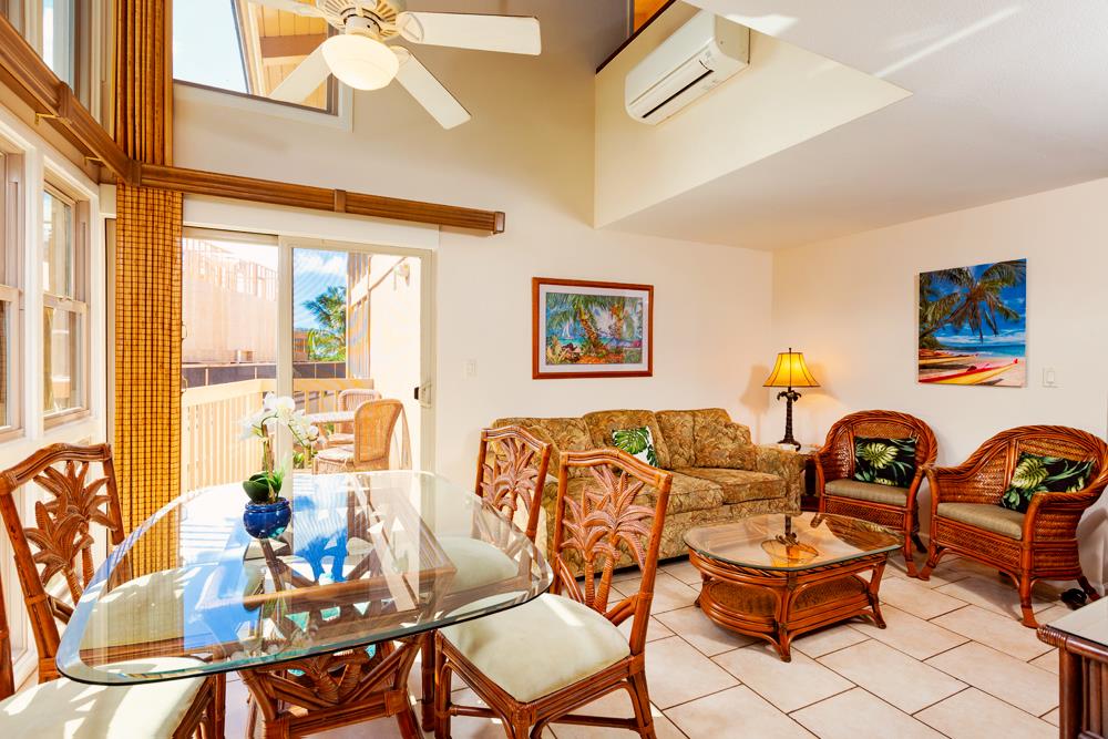 115 North Kihei Road, Unit B1 Kihei, HI 96753 - Photo 5 of 29 a living room with patio furniture and two windows