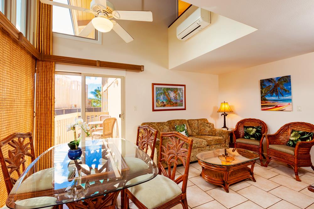 115 North Kihei Road, Unit B1 Kihei, HI 96753 - Photo 7 of 29 a living room with furniture a rug and a window