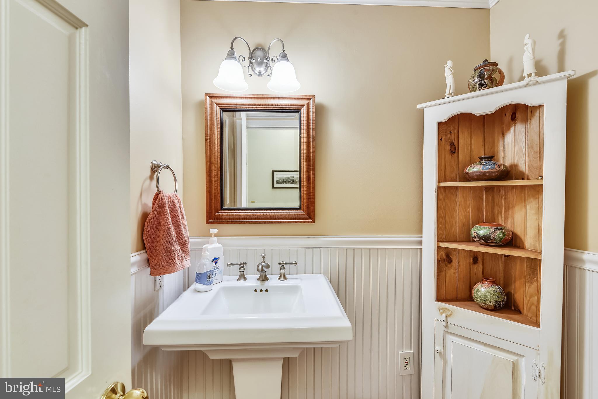 252 Charring Court Riva, MD 21140 - Photo 26 of 57 1/2 bath on main level with wainscoting