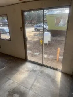 a view of a glass entrance door with glass window