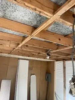 a view of a room with a wooden stairs