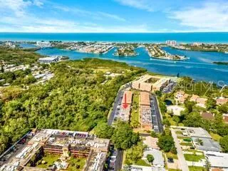 a view of a city with an ocean view