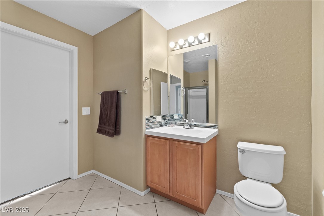 4705 Apulia Drive, Unit 103 North Las Vegas, NV 89084 - Photo 11 of 23 Bathroom with vanity