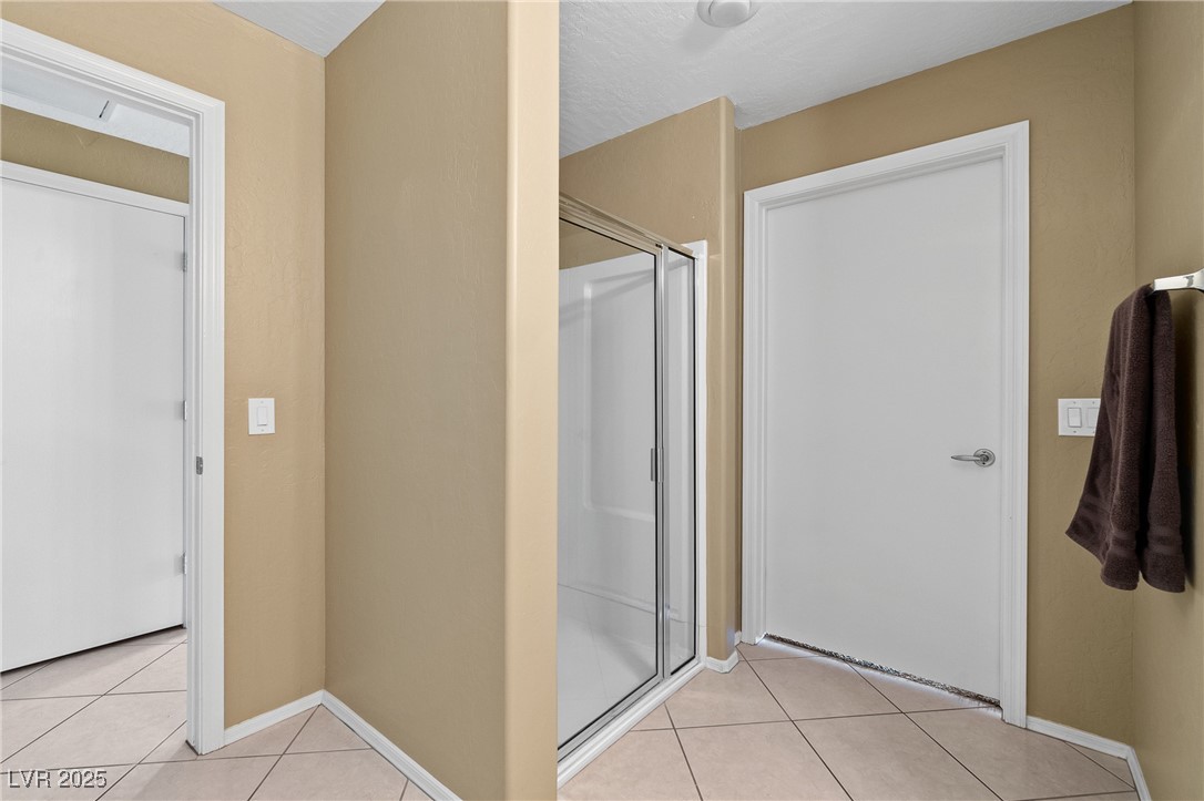 4705 Apulia Drive, Unit 103 North Las Vegas, NV 89084 - Photo 12 of 23 Bathroom with walk in shower