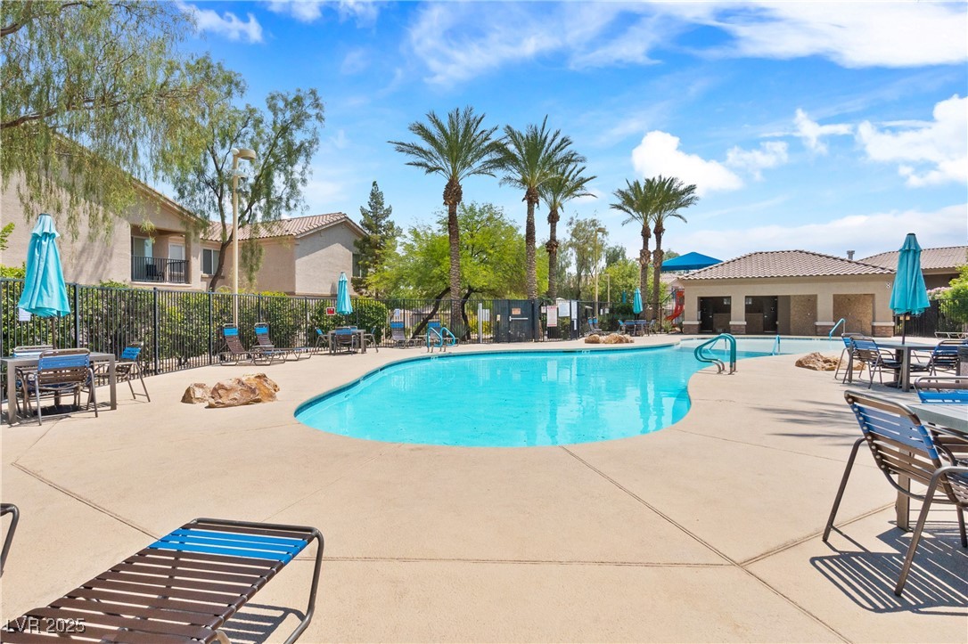 4705 Apulia Drive, Unit 103 North Las Vegas, NV 89084 - Photo 3 of 23 Community pool featuring a patio area
