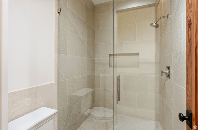 2155 East Wrangler Road Kamas, UT 84036 - Photo 28 of 62 Full bathroom with a stall shower and tile walls