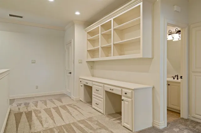 a view of a kitchen with a sink