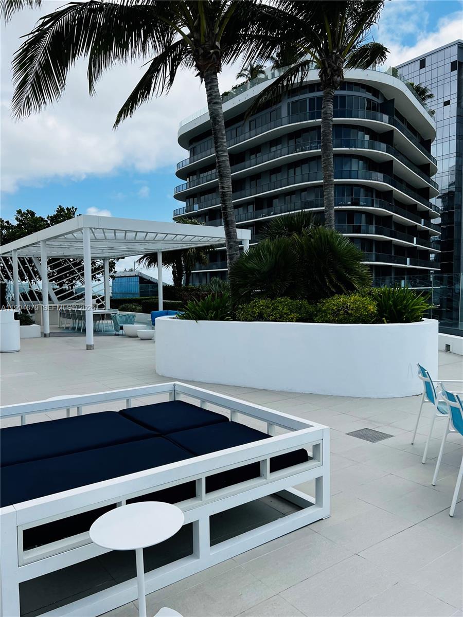 45 Southwest 9th Street, Unit 2004 Miami, FL 33130 - Photo 22 of 28 a view of balcony with furniture