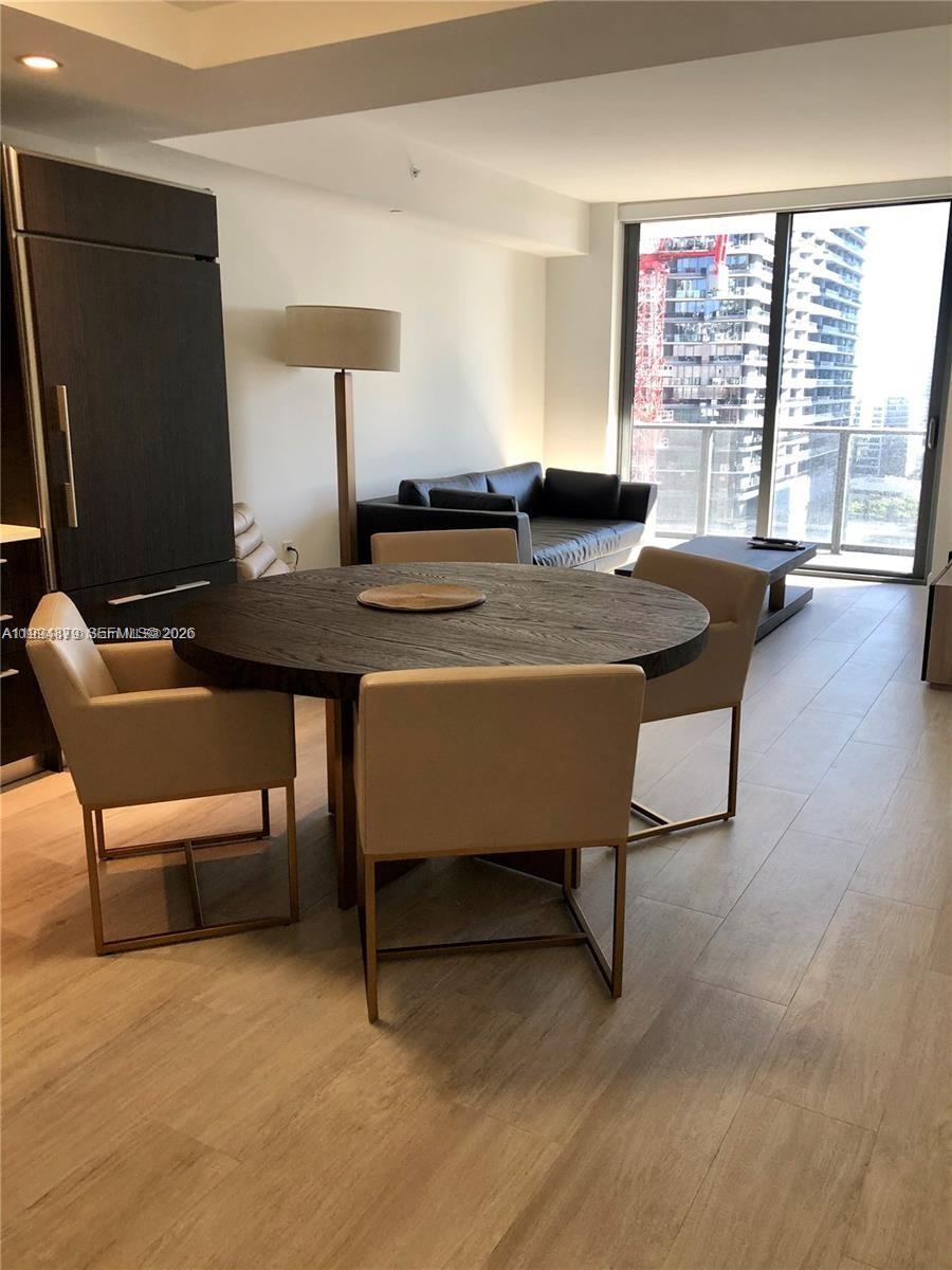 45 Southwest 9th Street, Unit 2004 Miami, FL 33130 - Photo 6 of 28 a room with furniture pool table and windows