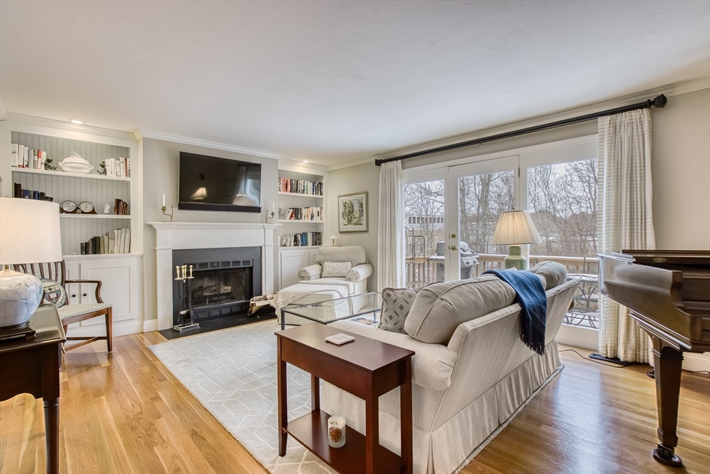 433 Main Street, Unit 4 Medfield, MA 02052 - Photo 15 of 36 a living room with furniture and a fireplace