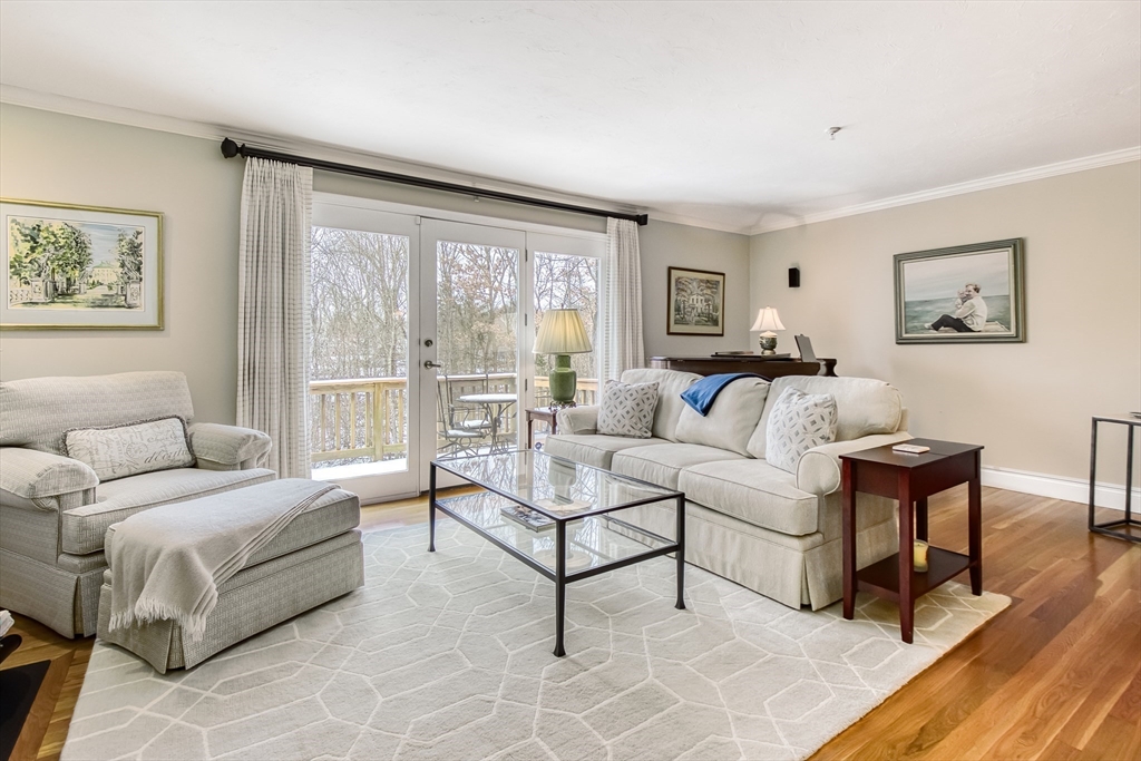 433 Main Street, Unit 4 Medfield, MA 02052 - Photo 16 of 36 a living room with furniture and a large window