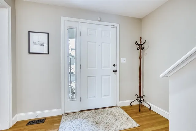 a view of hallway with washer and dryer