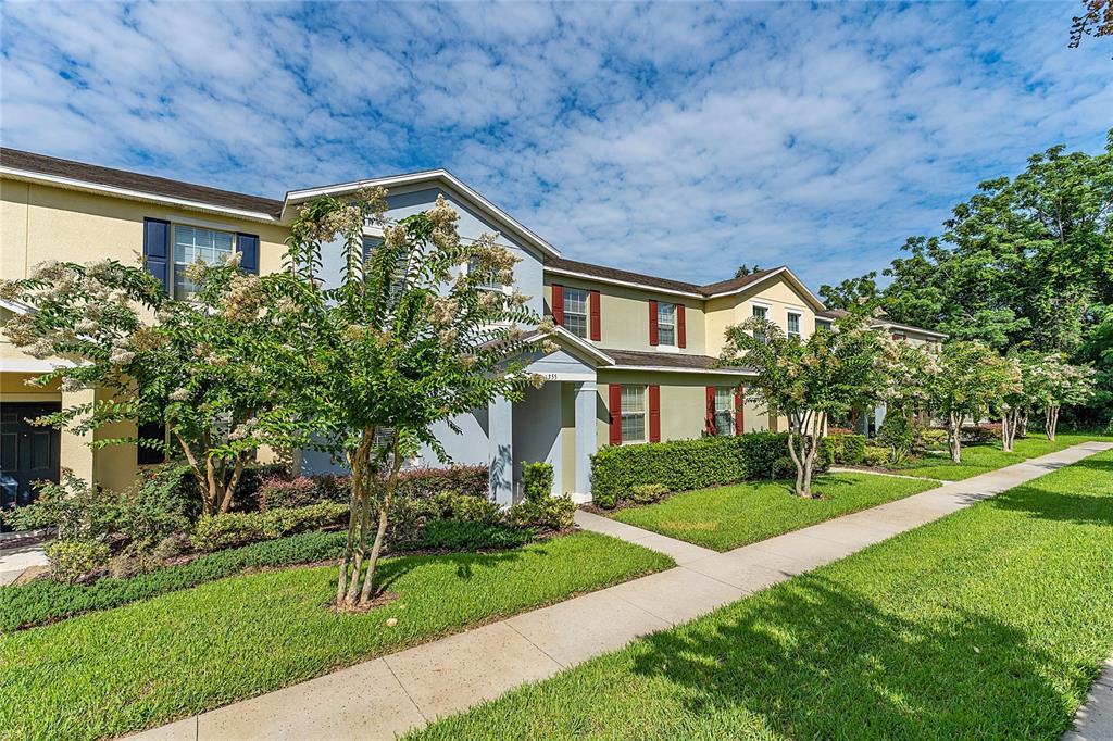 1355 Vasey Road Apopka, FL 32703 - Photo 2 of 41 a front view of a house with a yard
