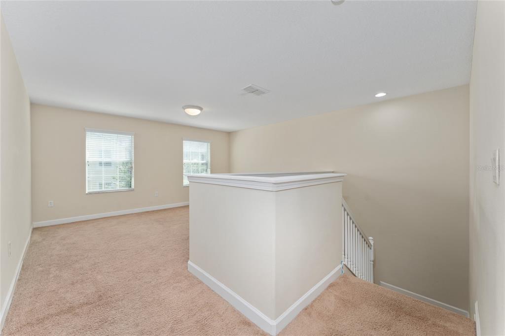 1355 Vasey Road Apopka, FL 32703 - Photo 24 of 41 an empty room with windows