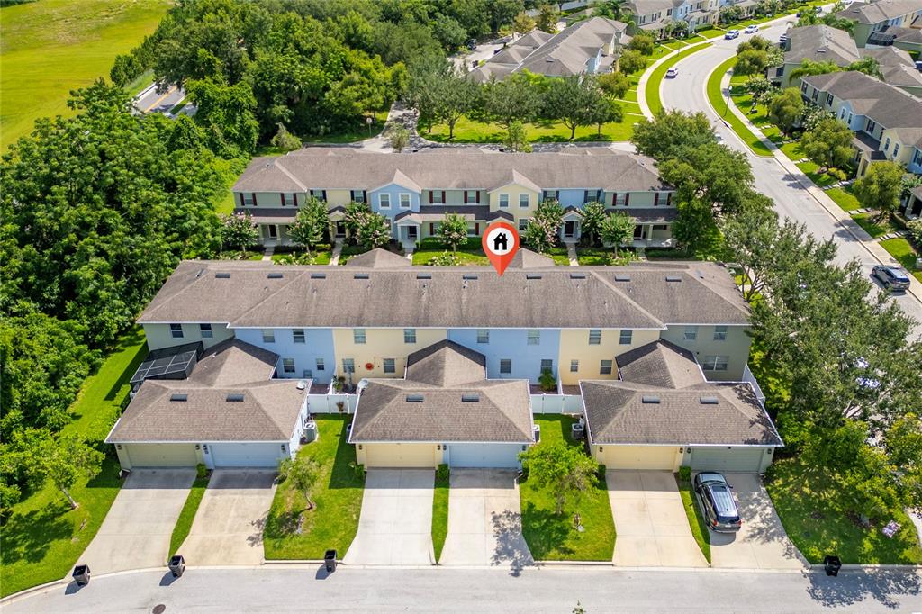 1355 Vasey Road Apopka, FL 32703 - Photo 7 of 41 an aerial view of a house with a garden