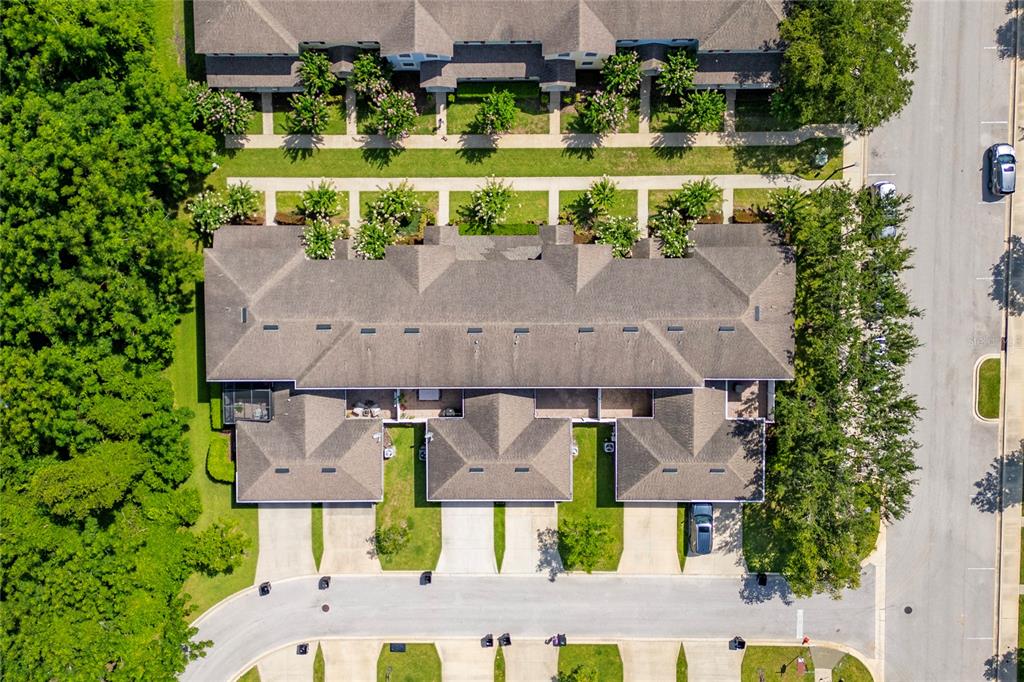1355 Vasey Road Apopka, FL 32703 - Photo 10 of 41 an aerial view of a house with a garden and swimming pool