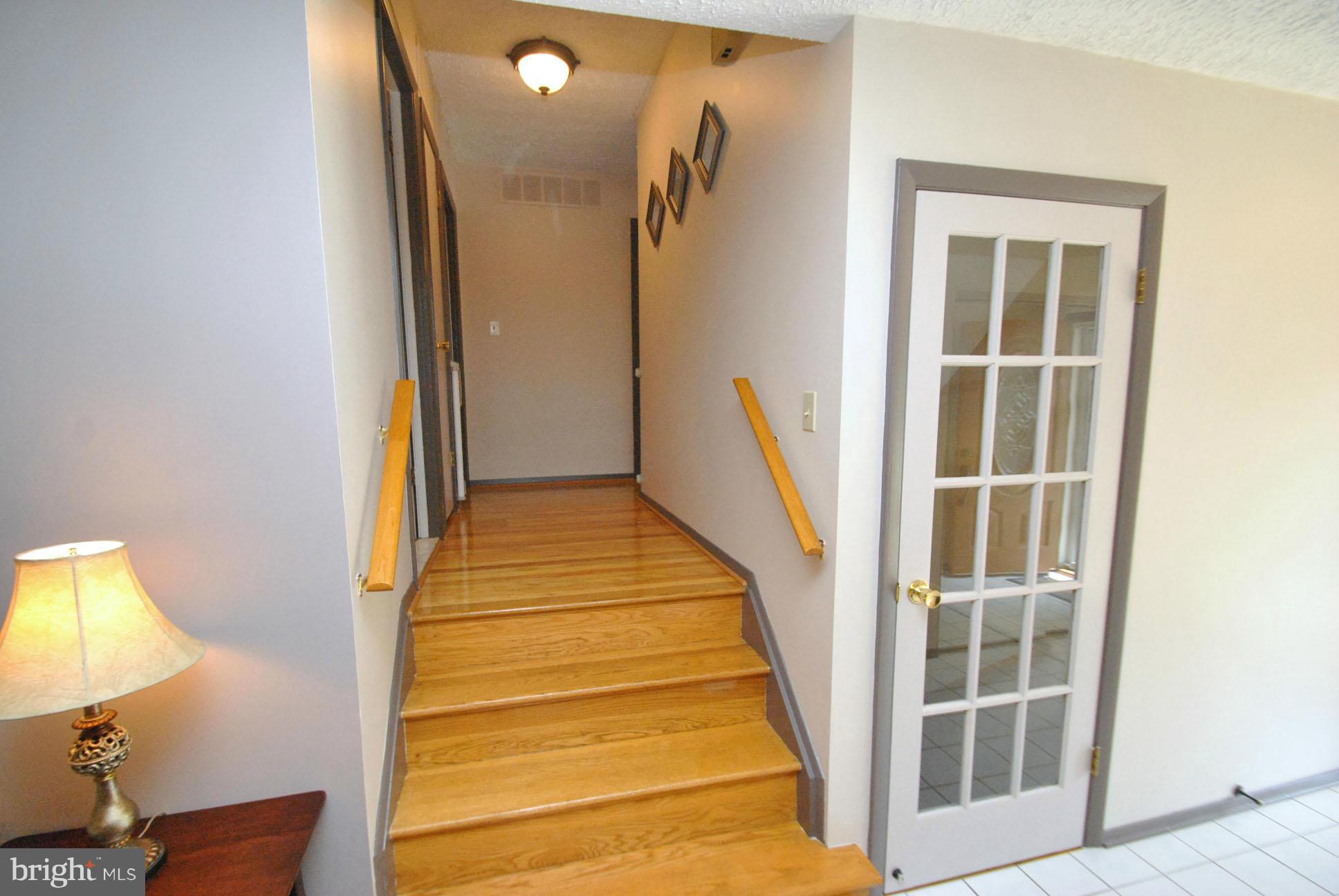 4216 Winterode Way Baltimore, MD 21236 - Photo 12 of 30 STAIRS TO UPPER LEVEL