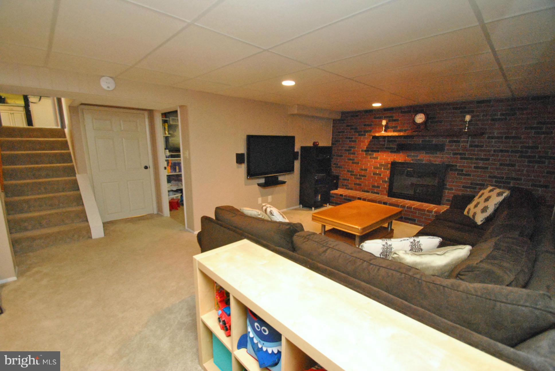 4216 Winterode Way Baltimore, MD 21236 - Photo 21 of 30 FAMILY ROOM W/WOOD BURNING FIREPLACE