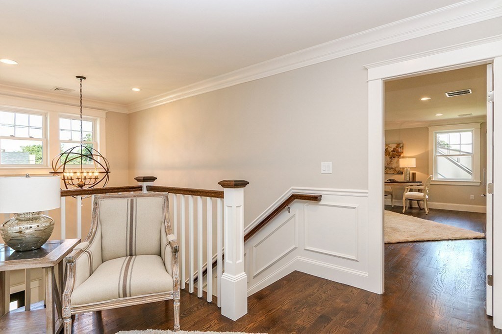 80 Sachem Road Needham, MA 02494 - Photo 15 of 26 a view of a hallway with furniture and staircase