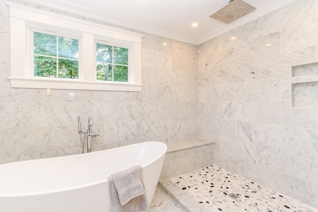 80 Sachem Road Needham, MA 02494 - Photo 20 of 26 a bathroom with a bathtub and shower