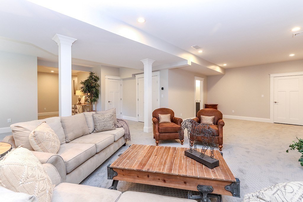 80 Sachem Road Needham, MA 02494 - Photo 23 of 26 a living room with furniture and wooden floor