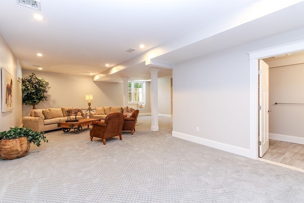 80 Sachem Road Needham, MA 02494 - Photo 24 of 26 a living room with furniture and a couch