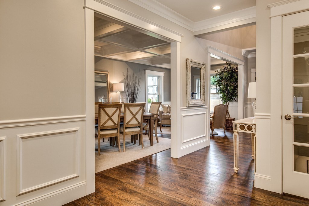 80 Sachem Road Needham, MA 02494 - Photo 6 of 26 wooden floor with dining table and chairs