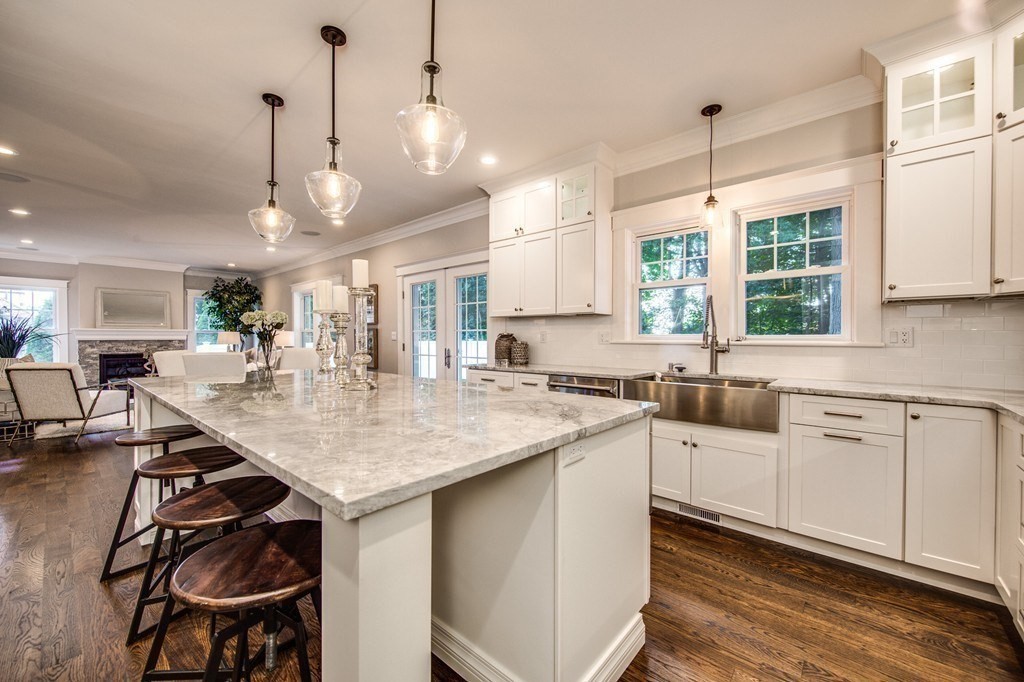 80 Sachem Road Needham, MA 02494 - Photo 10 of 26 a kitchen with lots of counter space sink and appliances