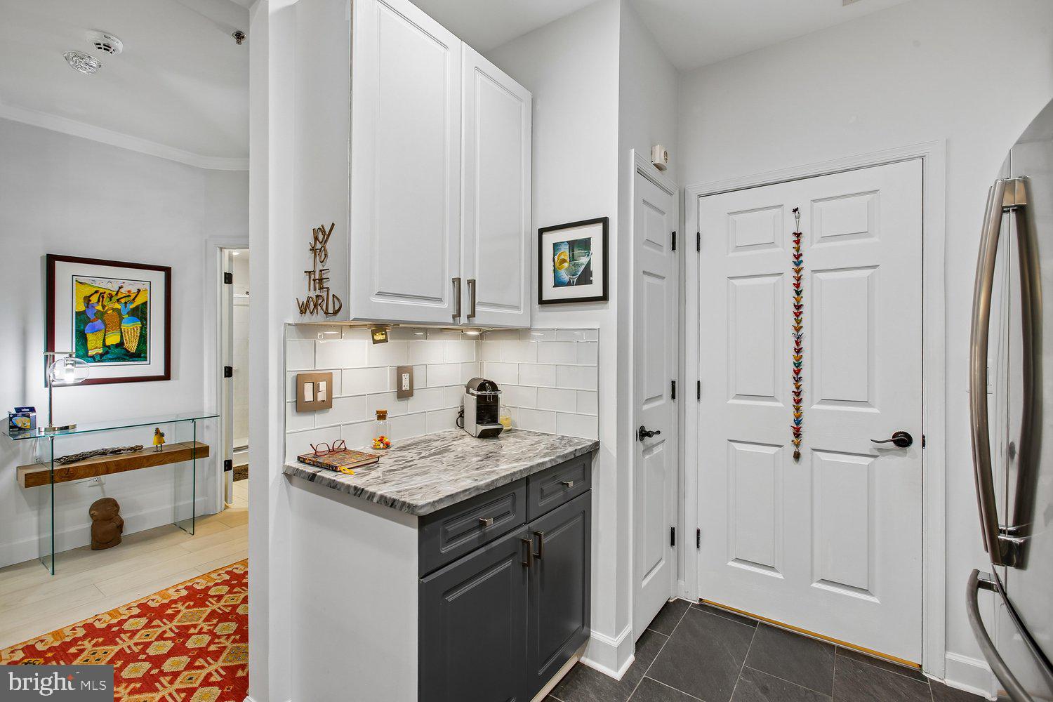 1855 Stratford Park Place, Unit 103 Reston, VA 20190 - Photo 12 of 49 Coffee bar area.