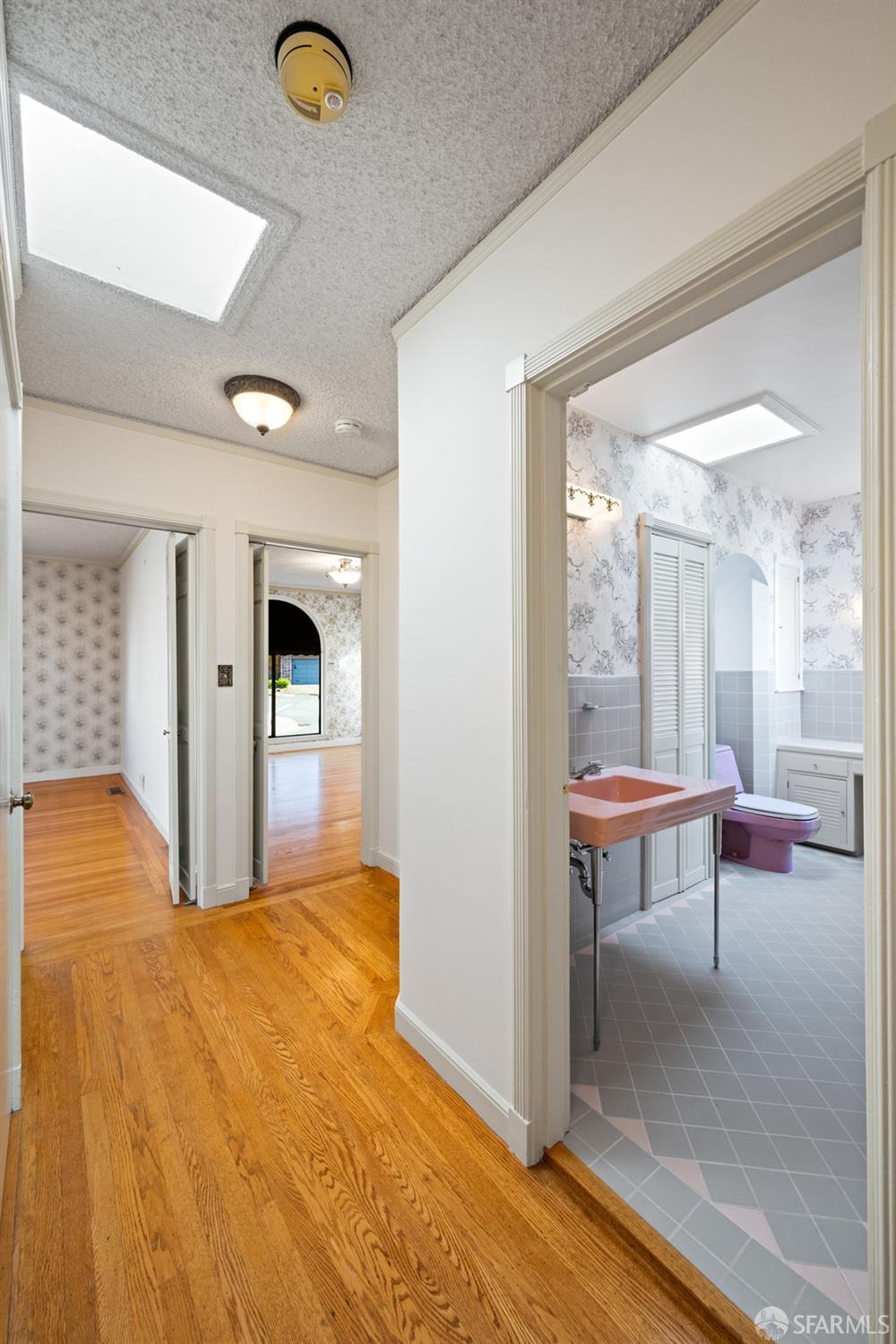 1653 16th Avenue San Francisco, CA 94122 - Photo 27 of 33 a bedroom with a bed and a table