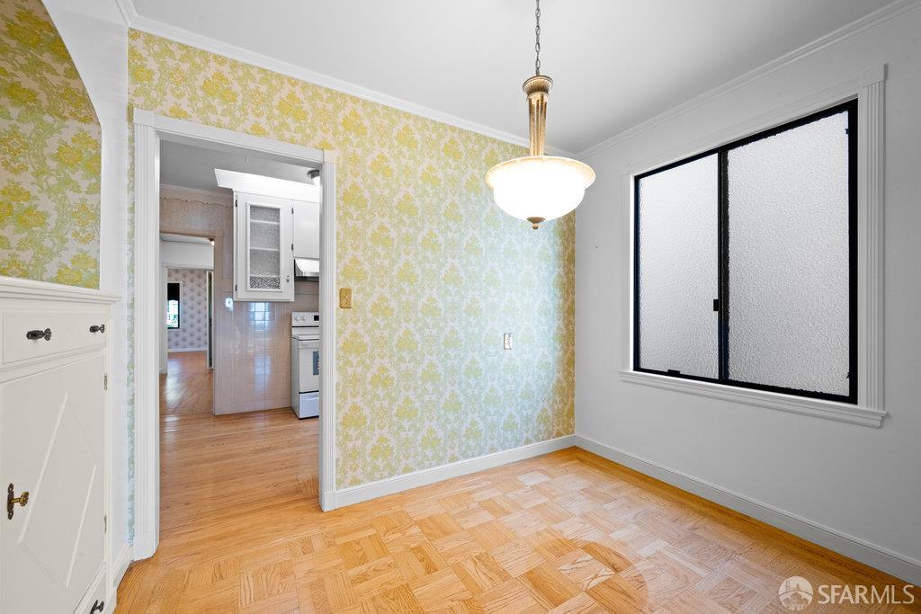 1653 16th Avenue San Francisco, CA 94122 - Photo 9 of 33 a view of a room with a windows and ceiling fan