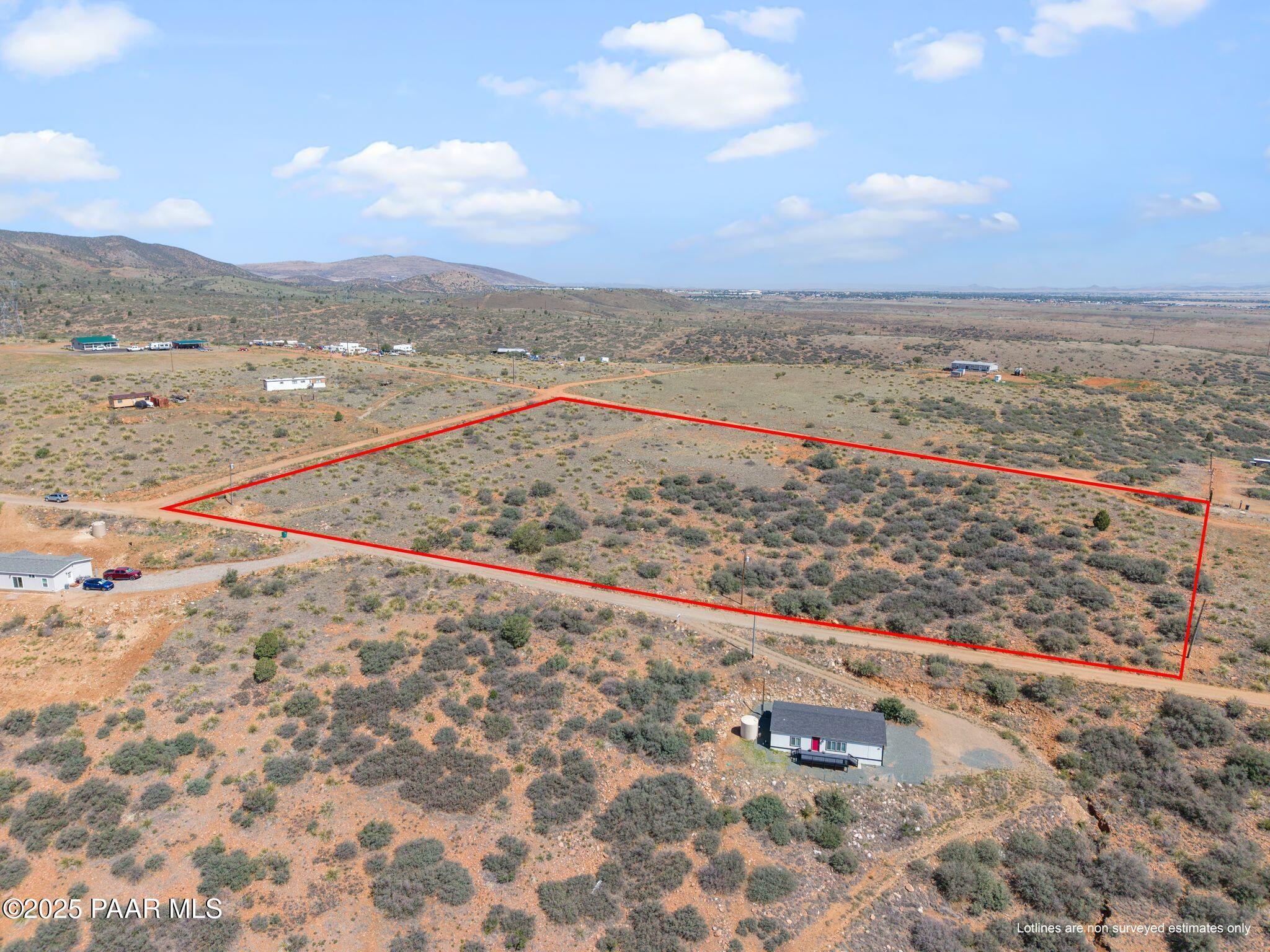 9180 Wolf Road Dewey-Humboldt, AZ 86327 - Photo 10 of 16 a view of an ocean beach and mountain
