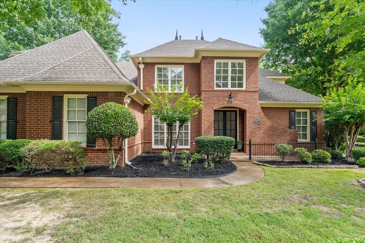 1876 Liles Lane Collierville, TN 38017 - Photo 36 of 36 Brick-clad exterior featuring multiple gables and a multi-pane window design