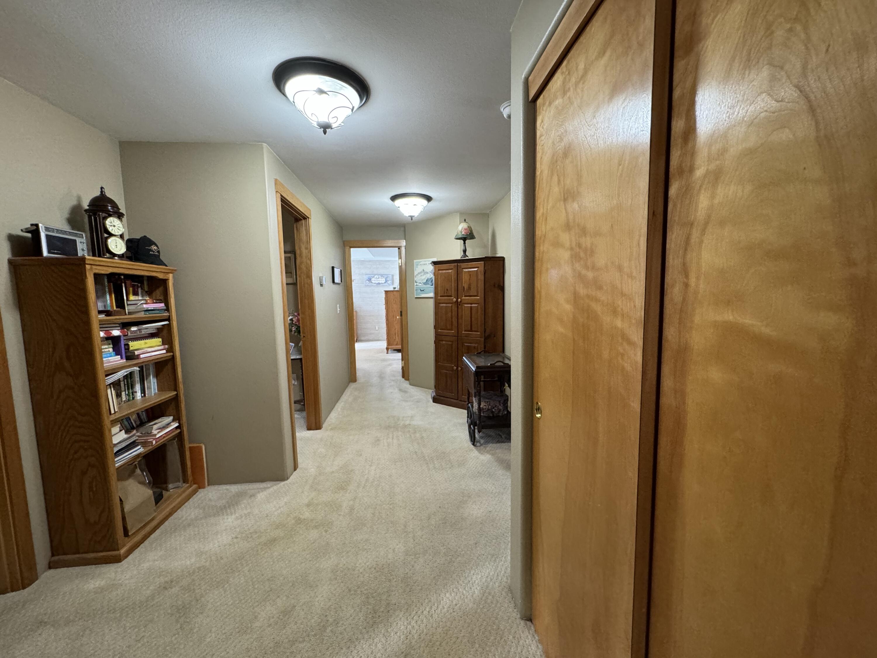 896 Ridgeview Drive Eagle Point, OR 97524 - Photo 7 of 17 a view of a hallway with furniture and closet