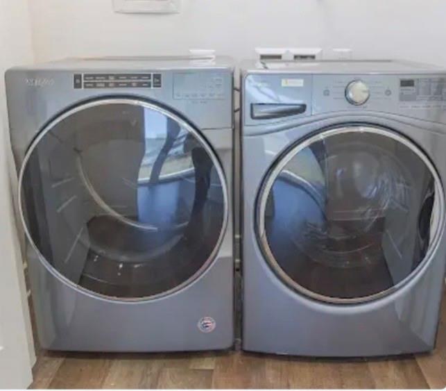 1700 Cedar Springs Road, Unit 2508 Dallas, TX 75201 - Photo 26 of 40 a utility room with a washer and dryer
