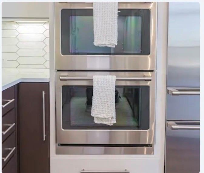 1700 Cedar Springs Road, Unit 2508 Dallas, TX 75201 - Photo 30 of 40 a utility room with washer and dryer