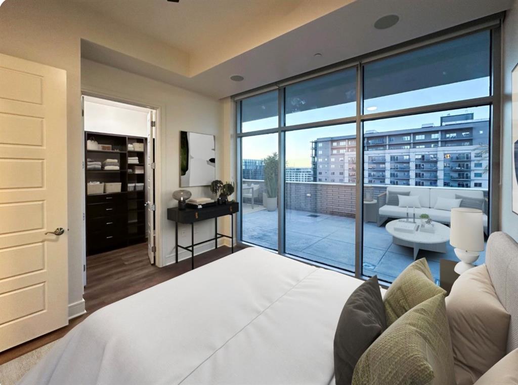 1700 Cedar Springs Road, Unit 2508 Dallas, TX 75201 - Photo 4 of 40 a bedroom with a bed and large window