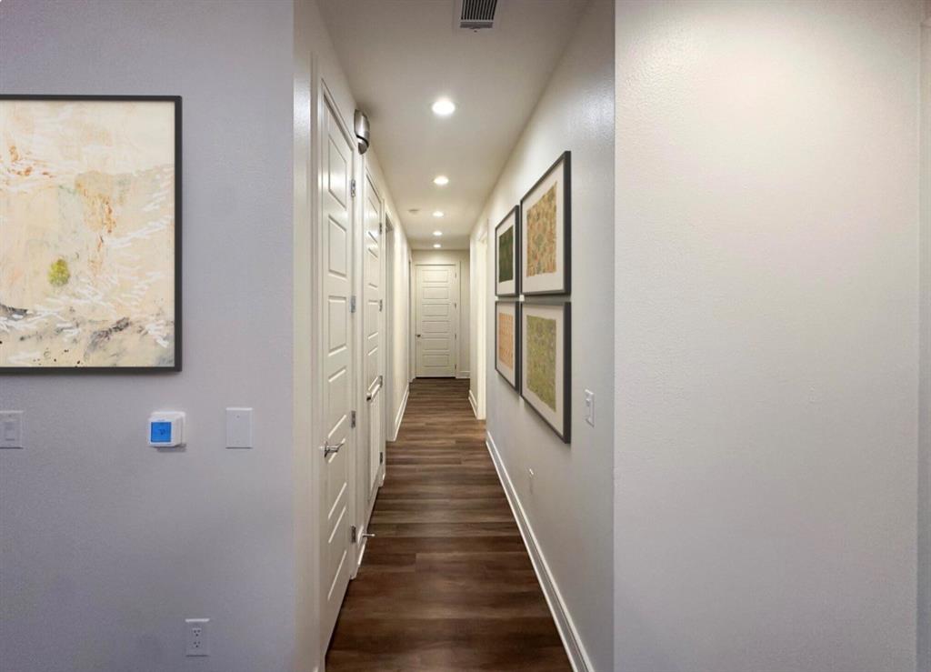 1700 Cedar Springs Road, Unit 2508 Dallas, TX 75201 - Photo 7 of 40 Hallway featuring recessed lighting and dark wood-style floors