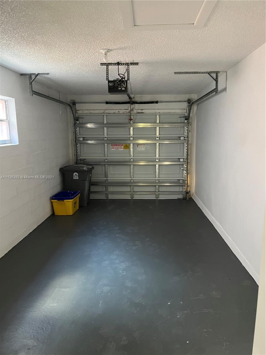 8309 Springtree Road, Unit 8309 Boca Raton, FL 33496 - Photo 8 of 18 a view of storage and utility room