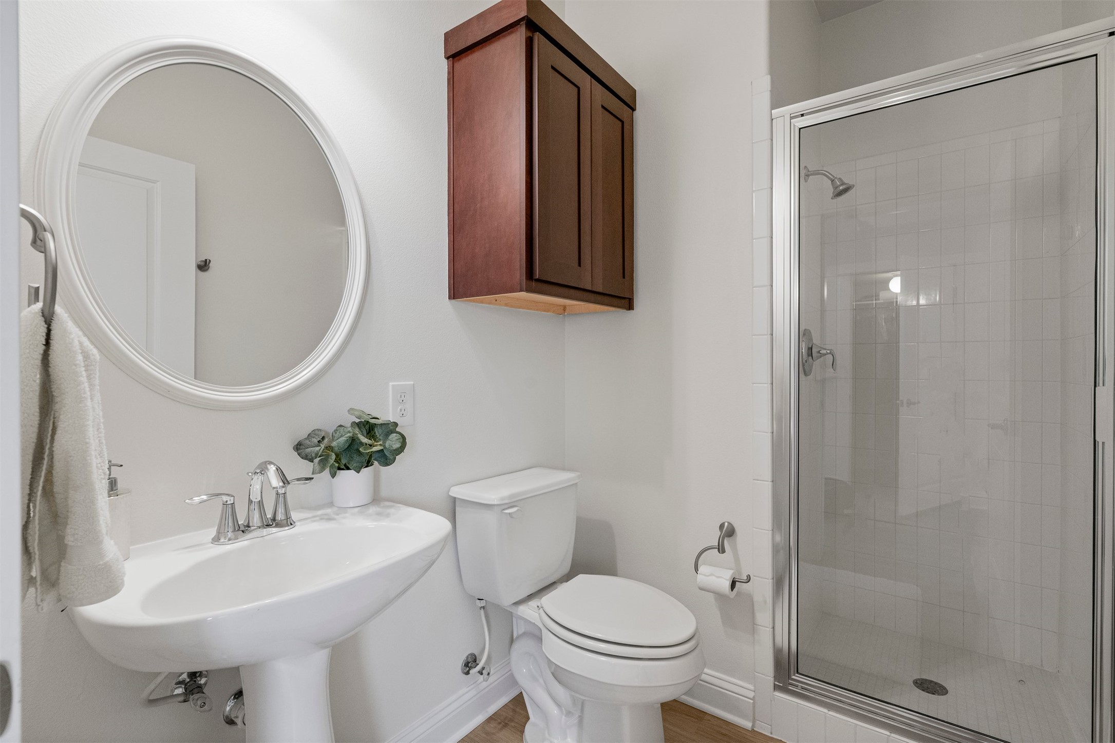 4216 Threadgill Street Austin, TX 78723 - Photo 27 of 40 a bathroom with a sink toilet and a mirror