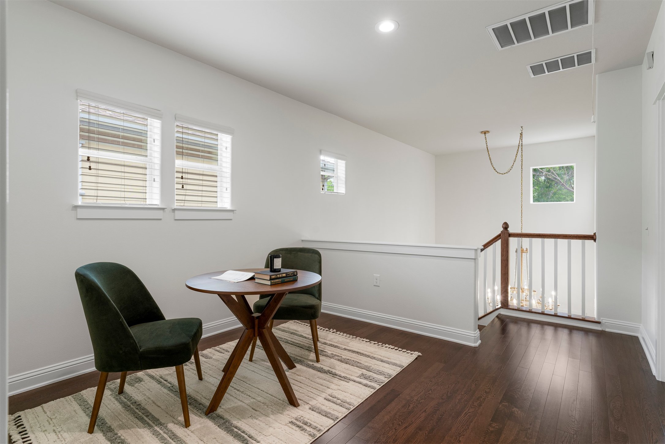 4216 Threadgill Street Austin, TX 78723 - Photo 28 of 40 a work room with furniture and wooden floor