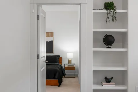 a view of hallway with washer and dryer