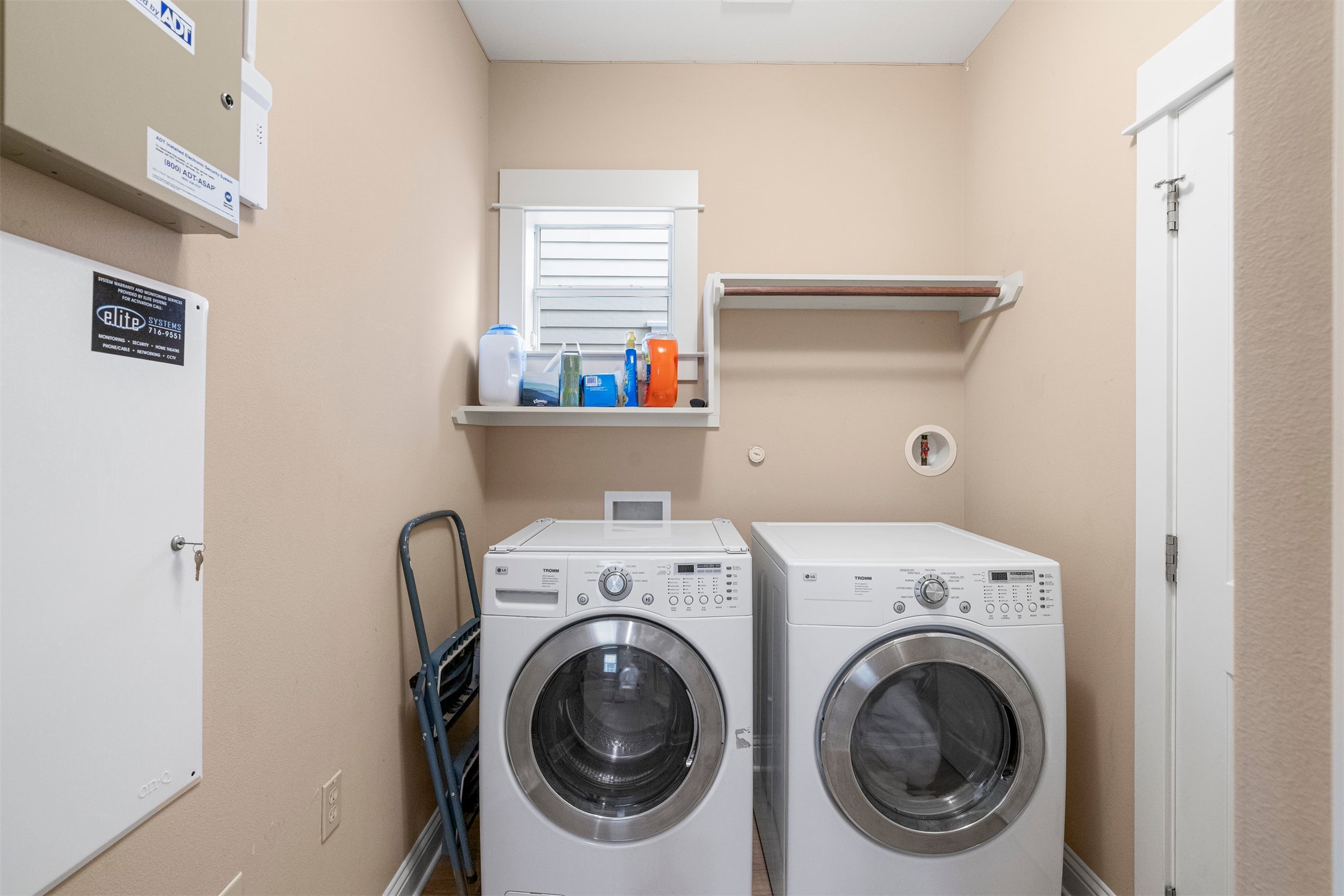 4216 Threadgill Street Austin, TX 78723 - Photo 36 of 40 a utility room with dryer and washer