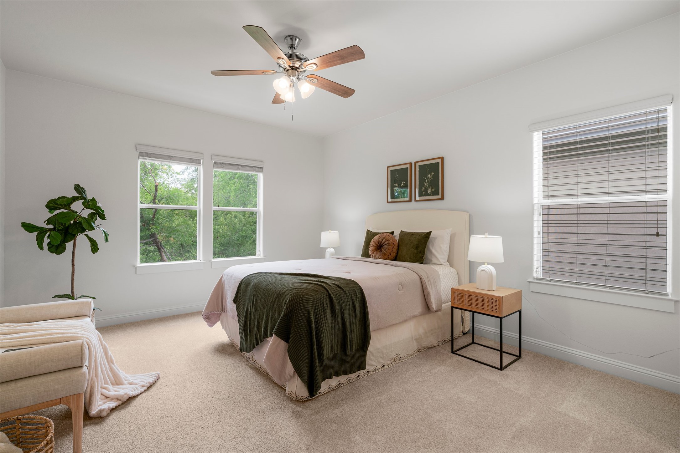 4216 Threadgill Street Austin, TX 78723 - Photo 7 of 40 a spacious bedroom with a bed and a window