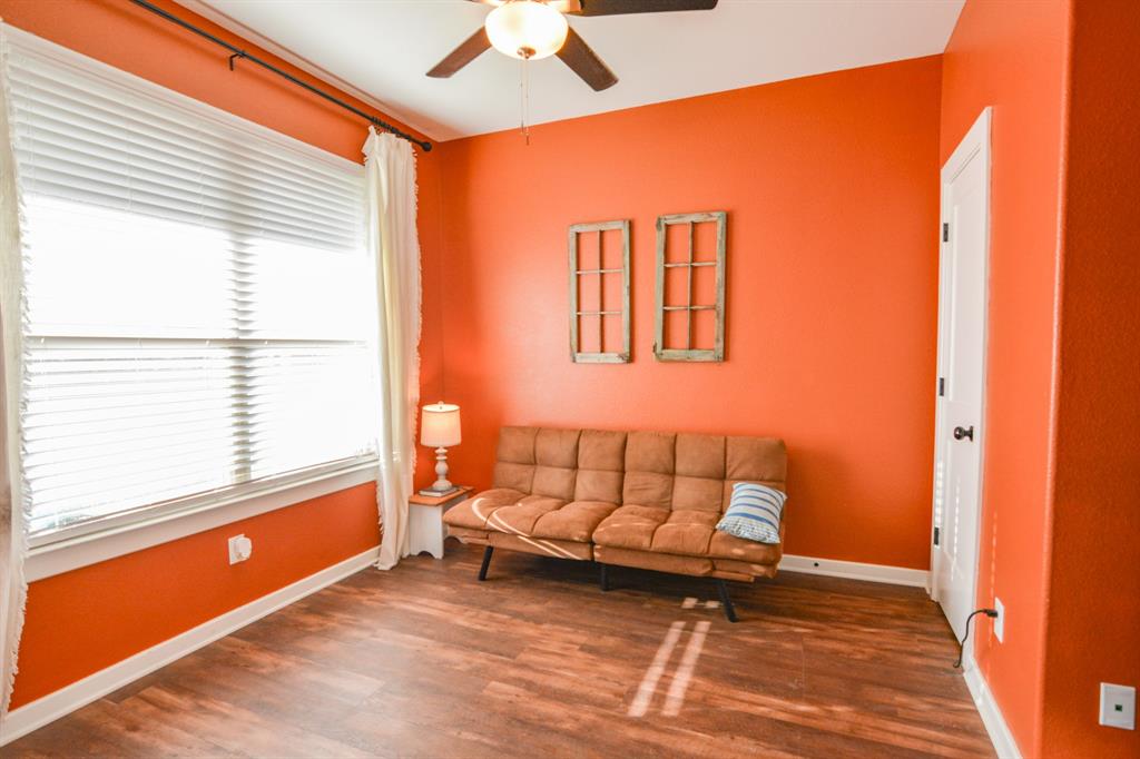 601 Mathew Street Grandview, TX 76050 - Photo 5 of 40 a living room with furniture and a window