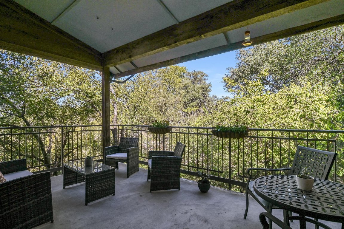 8200 Neely Drive, Unit 206 Austin, TX 78759 - Photo 15 of 26 a balcony with chairs and a table
