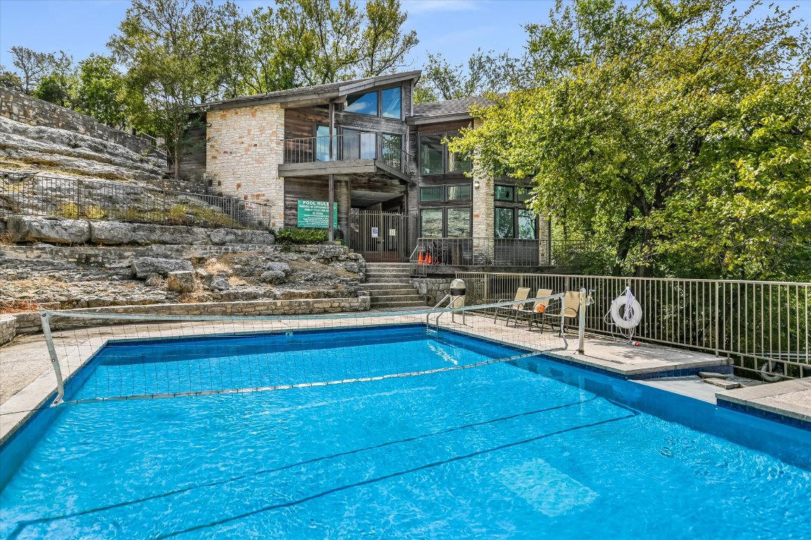 8200 Neely Drive, Unit 206 Austin, TX 78759 - Photo 24 of 26 a swimming pool with outdoor seating and yard